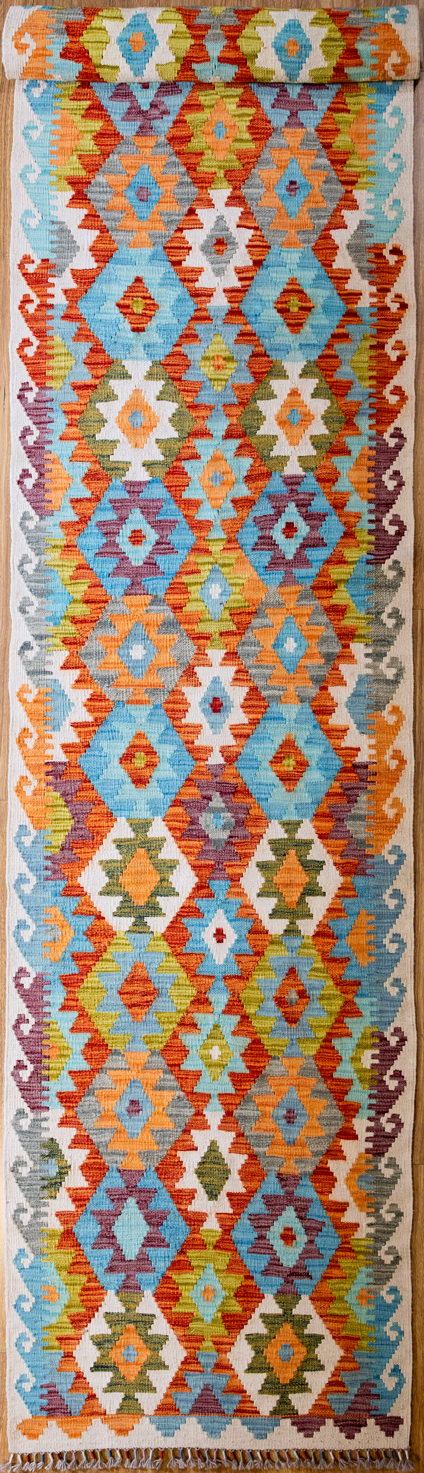 Kilims are a flatweave runner used for over a millennium in Tribal areas of Central Asia &amp; Anatolia. Historically used by nomads as floor covering, tent covering .Transported on horseback by camels because of  its lightweight nature
Perfect for a summer runner, coastal or to bring more character and life into your interior