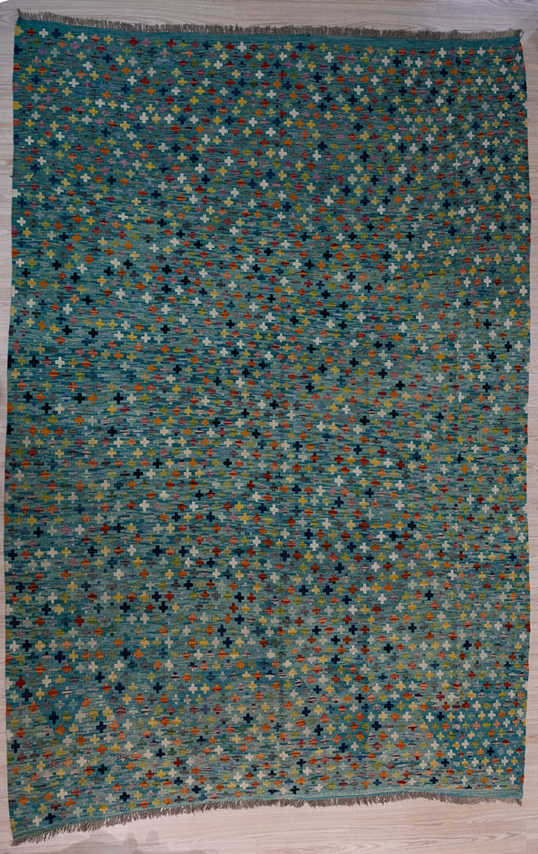 Authentic Hand Knotted Marled Acqua Blue Modern Afghan Wool Kilim 347cm x 247cm suitable for dining, large living or bedroom areas.
Multicoloured accents on a marled hand dyed aqua field with all colours made from natural vegetable dyes
