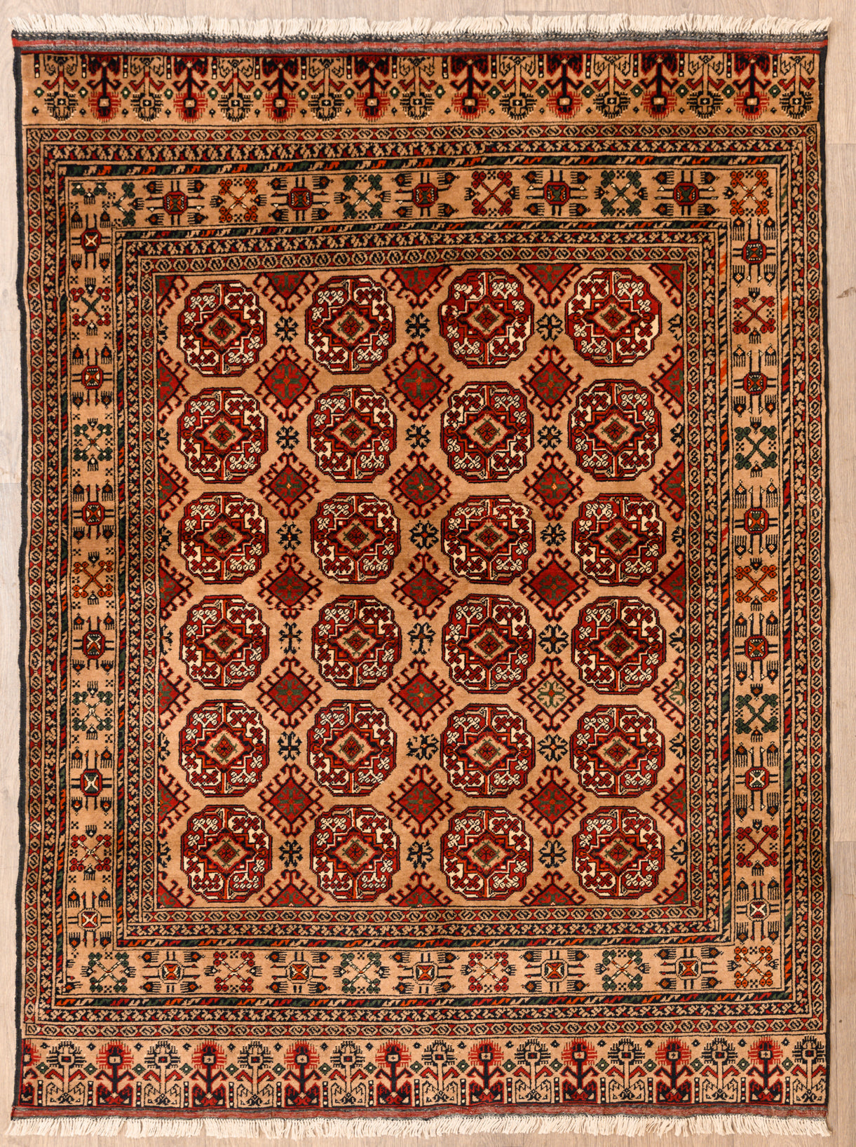 Beige Afghan Kundus Bokhara Wool Rug 199cm x 151cm Beige tone background not common in this style. 
Kundu quality woollen weave with Bokhara Gul design within a stylisedfloral border