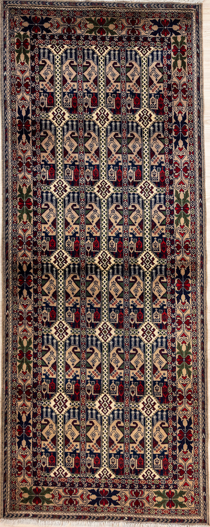 Authentic Handknotted Beige Pictorial Afghan Kundus Wool Runner 210cm x 82cm woven in Kundus, Northern Afghanistan
Unique Bashiri or Beshiri design all over with Boteh and other cultural pictorial symbols celebrates the fine artistry of the Kundus region.&nbsp;
Having a light and darker aspect is a trademark of Handmade Rugs