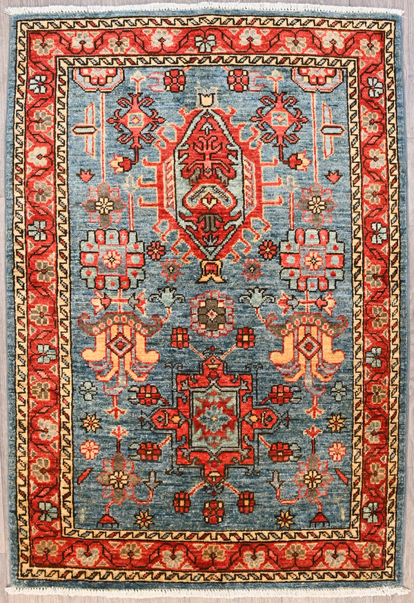 Authentic Handknotted Blue Afghan Ariana Chobi Wool Rug 126cm x 85cm woven in Shebarghan, Northern Afghanistan

Lovely Natural veg dyed colour palette depicts multiple elaborate medallion designs on a blue abrash background. The wide undulating border gives a finishing touch.

Stylish and practical Ariana tassels woven on the ends of the rug&nbsp;
Having a light and darker aspect is a trademark of Handmade Rugs