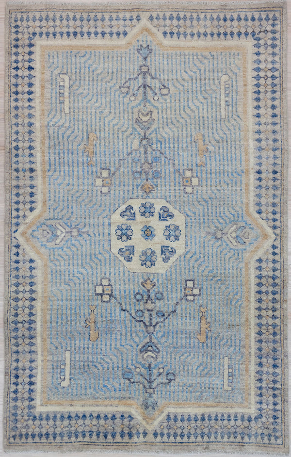 Authentic Handknotted Blue Afghan Chobi Wool Rug 190cm x 122cm
Beautiful muted tones all made from natural vegetable dyes including indigo.
An unusual meditative design suggesting ripples in a fountain or maybe a raked gravel, zen garden. Colour variations within the blue woolsadds to the visual ripple effect

Unique contemporary design adaption, perfect for a special space&nbsp;
Having a light and darker aspect is a trademark of Handmade Rugs