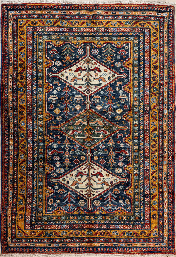 Authentic Handknotted Blue Afghan Chobi Wool Rug 202cm x 156cm woven in Central Asia
A unique all over design of abstracted birds, botanical elements and other motifs woven in from cultural memory makes a rug to intrigue the eye.
Two large cream symmetrical lozenge on each end a central element reference Shiraz or Qashquai style. If something is good it's worth repeating, but in lighter weight for a more temperate climate
