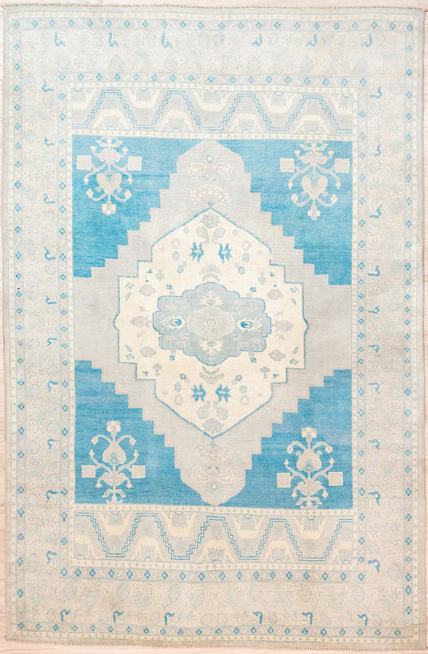 Authentic Hand Knotted Blue Grey Afghan Chobi Wool Rug 278cm x 184cm suitable for medium to large areas
Muted gray and bold turquoise made from natural vegetable dyes gives a bold modern vibe.
Oushak Design light toned rug brightens your interior and opens your space
Having a light and darker aspect is a trademark of Handmade Rugs
Durable and Wear Resistant Suitable for High Traffic Areas