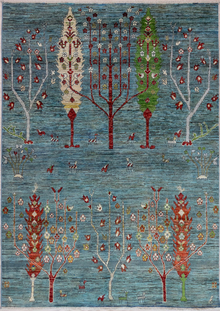 Authentic Handknotted Blue Pictorial Afghan Chobi Wool Rug 235cm x 144cm woven in Shebarghan, Northern Afghanistan

A one-of-a-kind rural pictorial design featuring an orchard theme including trees in Spring Blossum, a beekeeper's delight.

Having a light and darker aspect is a trademark of Handmade Rugs
Durable and Wear Resistant Suitable for High Traffic Areas
All Colours in This Piece Originate from Natural Vegetable Dyes