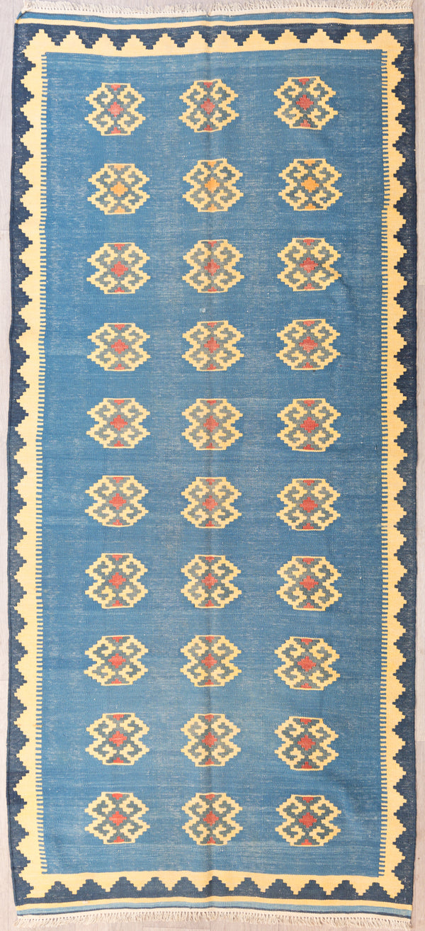 Authentic Vintage hand woven Blue Vintage Turkish Kilim 263cm x 120cm
Vintage Kilim handwoven c.1960's, blue colour pallette has aged gracefully giving a beautiful muted tone
Rare Kilim in this colour and size, kept in fine condition
Kilims are a light flatweave reversible rug