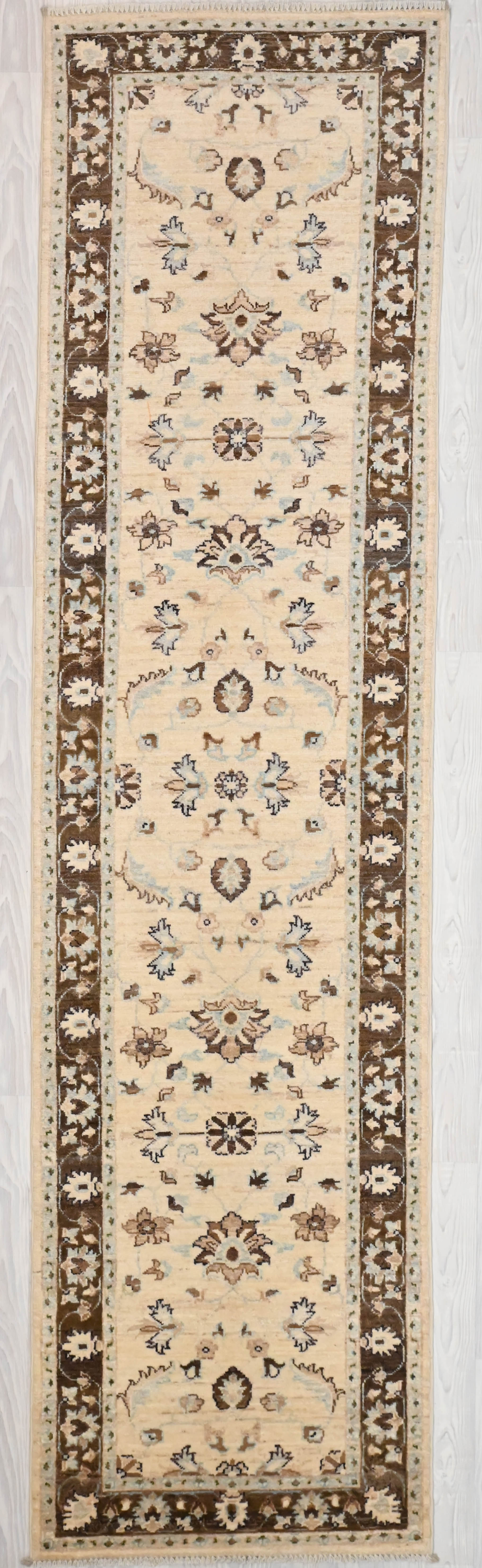 Authentic Handknotted Cream Afghan Chobi Wool Runner 301cm x 76cm
Finely handknotted by female artisans of Northern Afghanistan .Cream field tone ; brown border combination. Made from locally sourced natural dyes