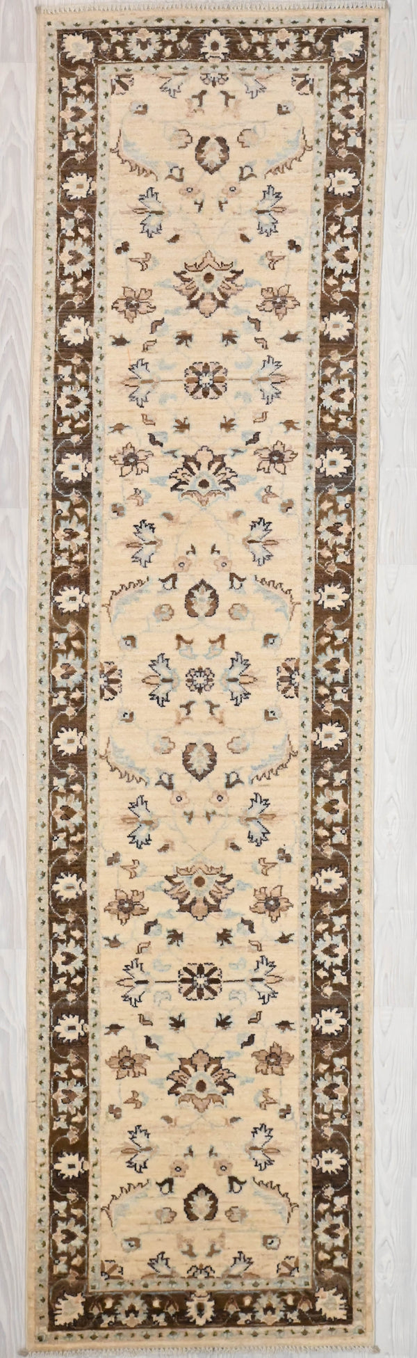 Authentic Handknotted Cream Afghan Chobi Wool Runner 301cm x 76cm
Finely handknotted by female artisans of Northern Afghanistan .Cream field tone ; brown border combination. Made from locally sourced natural dyes