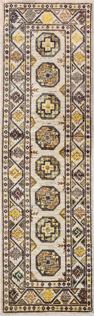 Authentic Hand knotted Cream Afghan Chobi Wool Runner 280cm x 82cm
Finely handknotted by female artisans of Northern Afghanistan rare light cream version of hexagonal Mori gul design
Cream field tone and earthy brown border combination made from locally sourced natural dyes.
Just gorgeous with dark wood to lighten and brighten your interior..