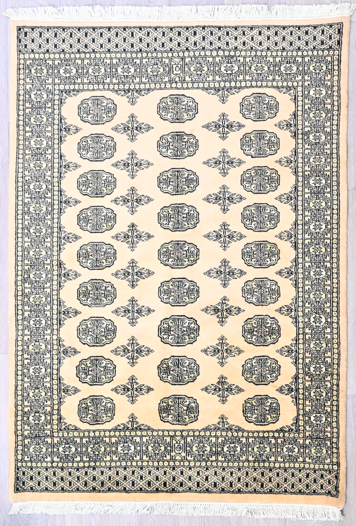 Authentic Handknotted Wool Cream Bukhara Rug woven in Central Asia
Soft elegant silk feel wool
Having a light and dark aspect is a trademark of Handmade Rugs
Durable and Wear Resistant&nbsp;