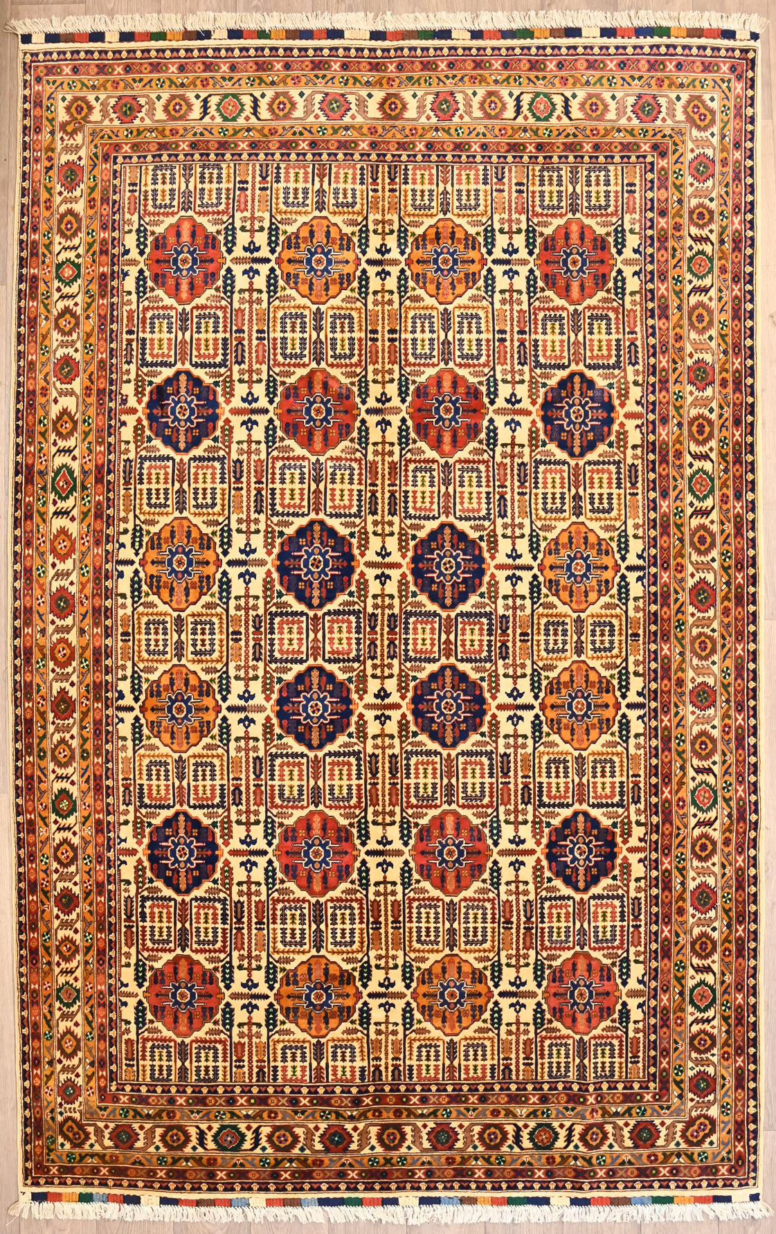 Authentic Handknotted Cream Fine Afghan Merinos Wool Rug 303cm x 191cm
Finely woven in the city Kundus, Northern Afghanistan using local Merinos wool
Symmetrical all over design with detailed border.&nbsp;
Arts and crafts revival style, suits Mission Style
Colour tones are derived from natural vegetable dyes - an array of cream, gold  brown colours combined in wonderful botanical curvilinear designs