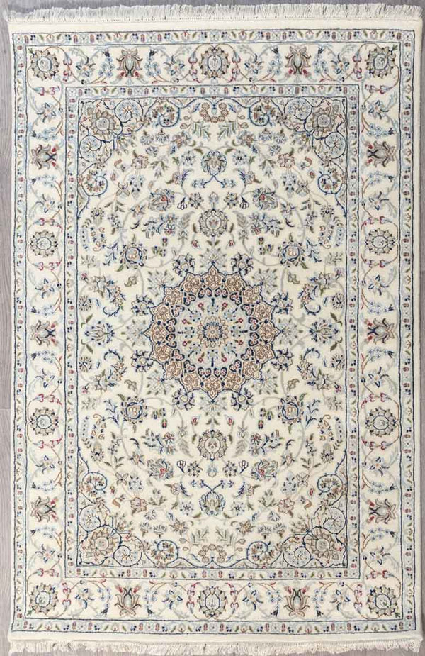 Cream Jaipur Nain Silk n Wool Rug 188cm x 124cm Finely hand knotted with both silk and wool with a substantial pile
A special indulgence for a special place in your home
Cream tone ground carries an all over design of botanical elements, flowers and vines, all rendered in naturally dyed earthy tones.
Having a light and dark aspect is a trademark of Handmade Rugs