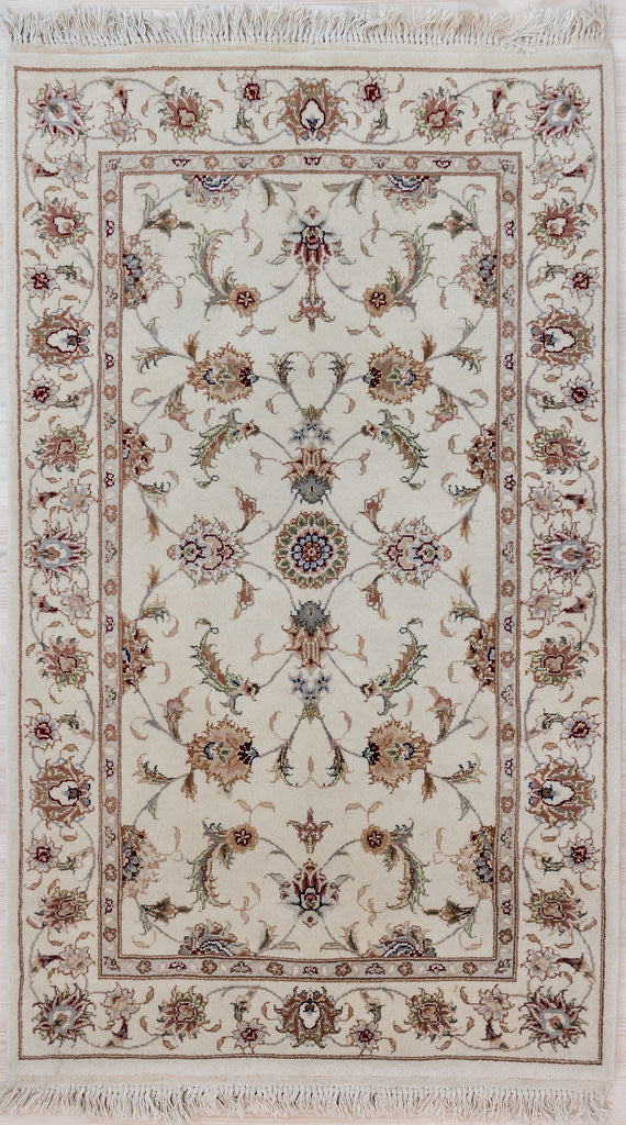 Cream Nain Jaipur Silk n Wool Rug 159cm x 97cm. Finely hand knotted with both silk and wool with a substantial pile
A special indulgence for a special place in your home
Cream tone ground carries an all over design of botanical elements, flowers and vines, all rendered in naturally dyed earthy tones.
Having a light and dark aspect is a trademark of Handmade Rugs

It Has Taken Approximately 4 Months of Weaving to Complete This Piece