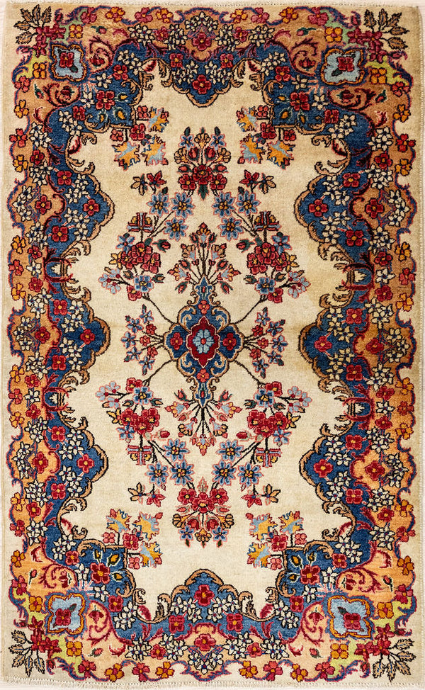 Cream Persian Kerman Wool Rug 146cm x 91cm .
Kerman is simIlar to Tabriz or Isfahan but quite refined as this regal little rug shows with its fine soft wool and perfect symmetry.
