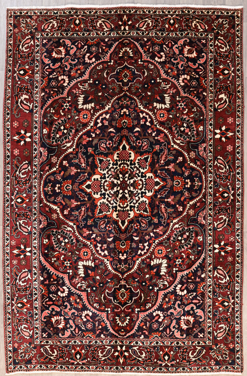 Authentic Handknotted Wool Dark Red Fine Persian Bakhtiari woven in Central Asia
Traditional ornate tribal village botanical design, woven from memory.
Having a light and darker aspect is a trademark of Handmade Rugs
Durable and Wear Resistant Suitable for High Traffic Areas