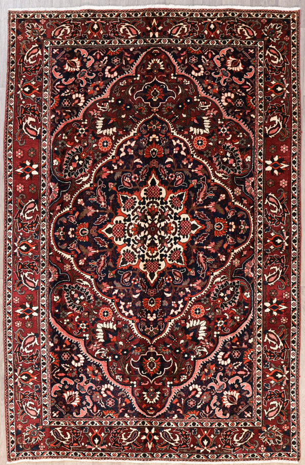 Authentic Handknotted Wool Dark Red Fine Persian Bakhtiari woven in Central Asia
Traditional ornate tribal village botanical design, woven from memory.
Having a light and darker aspect is a trademark of Handmade Rugs
Durable and Wear Resistant Suitable for High Traffic Areas