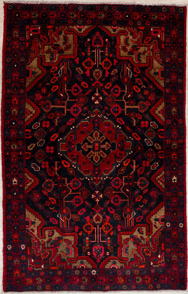 Bring a touch of Persian heritage into your home with this Dark Red Persian Hamadan Wool Rug 217cm x 140cm
Handknotted in the ancient city of Hamadan, this rug boasts a classic pattern and is made of pure sheep's wool for a soft, luxurious feel under your feet.
Deep indigo/black wool background contrasts with intense dark red floral designs. Details in cream complete the picture.
All coulours are natural vegetable dyes or colours of sheep. Dye techniques are passed down over generations