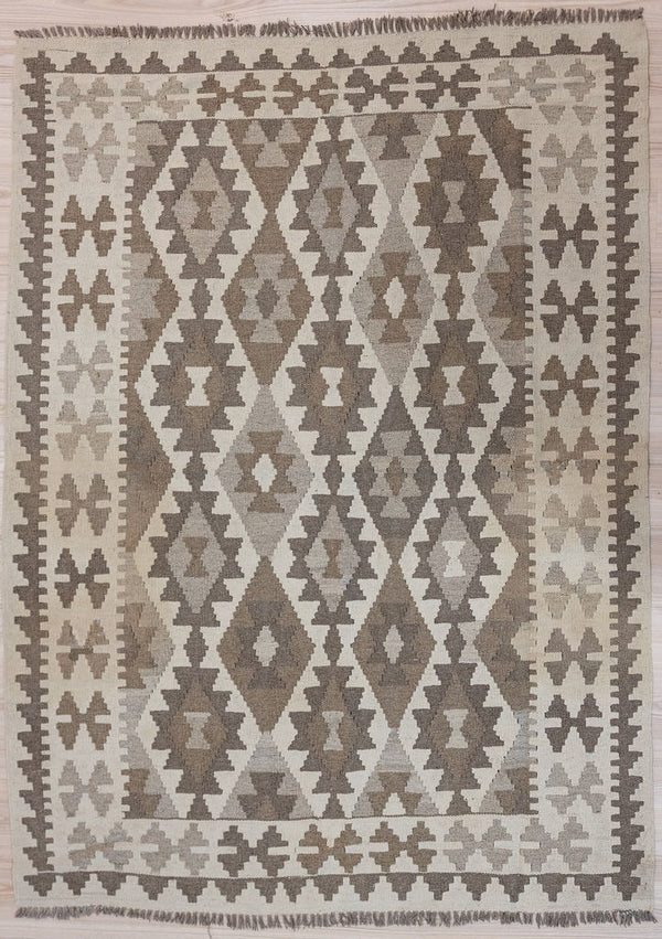 Authentic Handknotted Earthy Cream Afghan Boho Wool Kilim 196cm x 147cm
Beautiful earthy tones all round&nbsp;
Kilims are a flatweave rug used for over a millennium in Tribal areas of Central Asia and Anatolia. Historically used by nomads as floor covering, tent covering, carried; on horseback for its lightweight nature