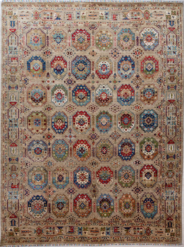 Authentic Handmade Fawn Geometric Afghan Chobi Wool Rug 360cm x 279cm made by local artisans of Afghanistan.
A design of bukhara elephant foot motifs, splendidly rendered in slight variations of patterns and displaying the full gamut of beautiful natural veg dyed colours without any clashes of tone

With the fawn Background made from natural undyed sheep wool, this is Truly a one of a kind piece of dyeing and weaving artistry