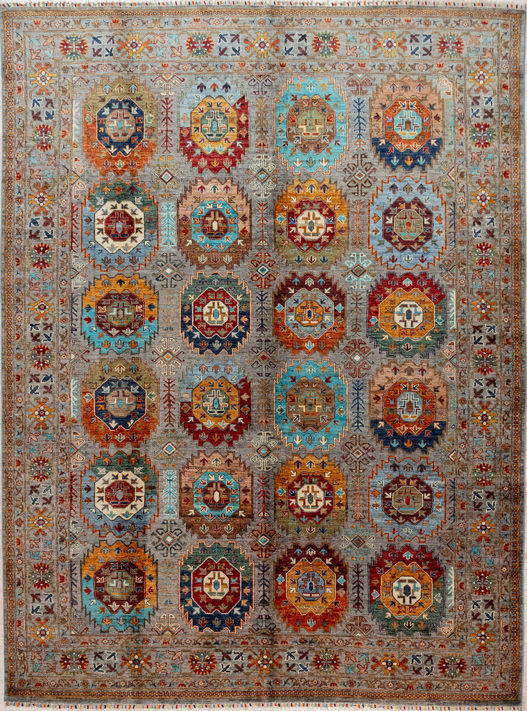 Authentic Handknotted Fine Grey Afghan Suzani Chobi Wool Rug 303cm x 246cm
Finely handknotted by female artisans of Northern Afghanistan
This one-off design is resplendent with 24 flower-like medallions giving an impression of ancient heraldry,
A background of natural grey sheep's wool is the perfect complement to naturally dyed colours sourced from local vegetation such as Madder, Indigo or Weld