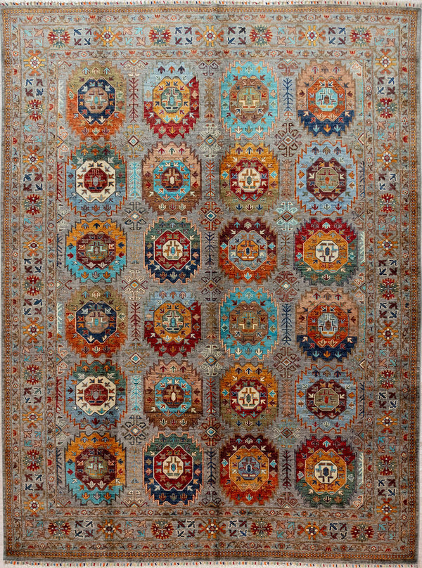 Authentic Handknotted Fine Grey Afghan Suzani Chobi Wool Rug 303cm x 246cm
Finely handknotted by female artisans of Northern Afghanistan
This one-off design is resplendent with 24 flower-like medallions giving an impression of ancient heraldry,
A background of natural grey sheep's wool is the perfect complement to naturally dyed colours sourced from local vegetation such as Madder, Indigo or Weld