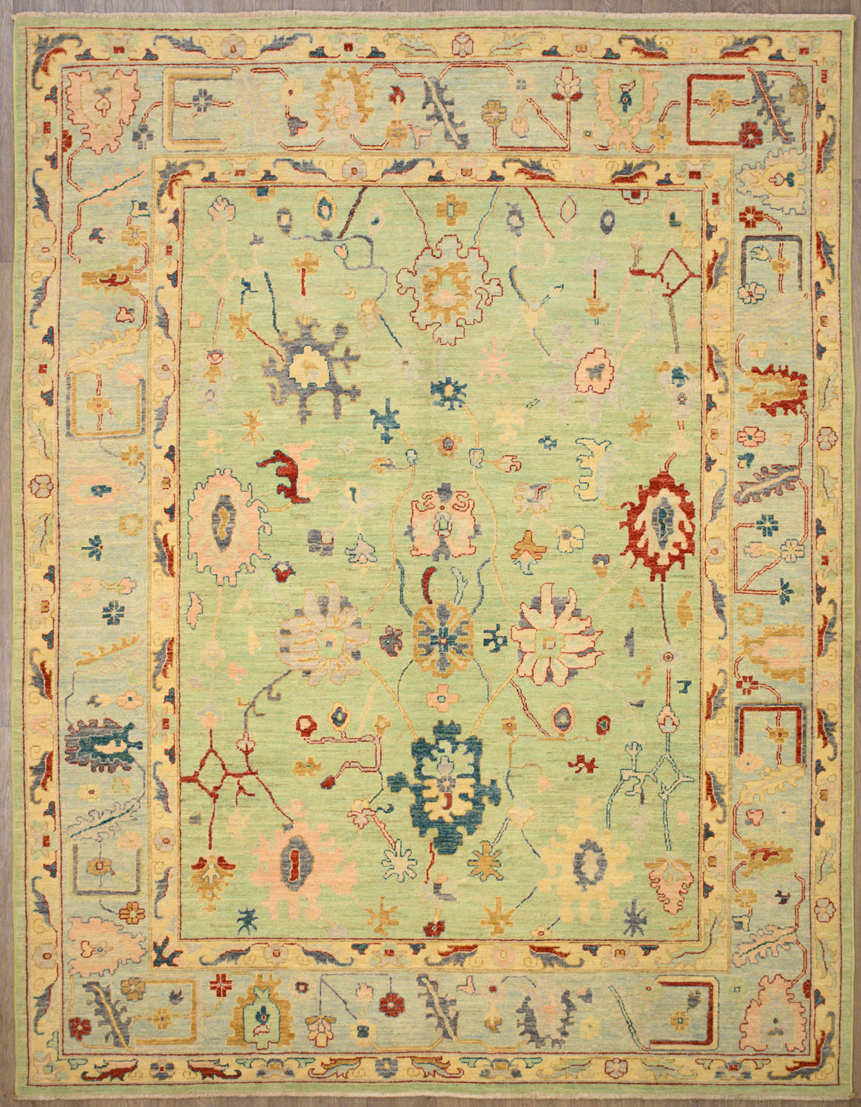 Authentic hand woven Green Fine Afghan Chobi Wool Rug 309cm x 242cm

Finely woven Chobi suitable for all rooms including the dining

Unique green colour field tones made through a lengthy process of double dying multiple veg dyes including saffron and indigo 