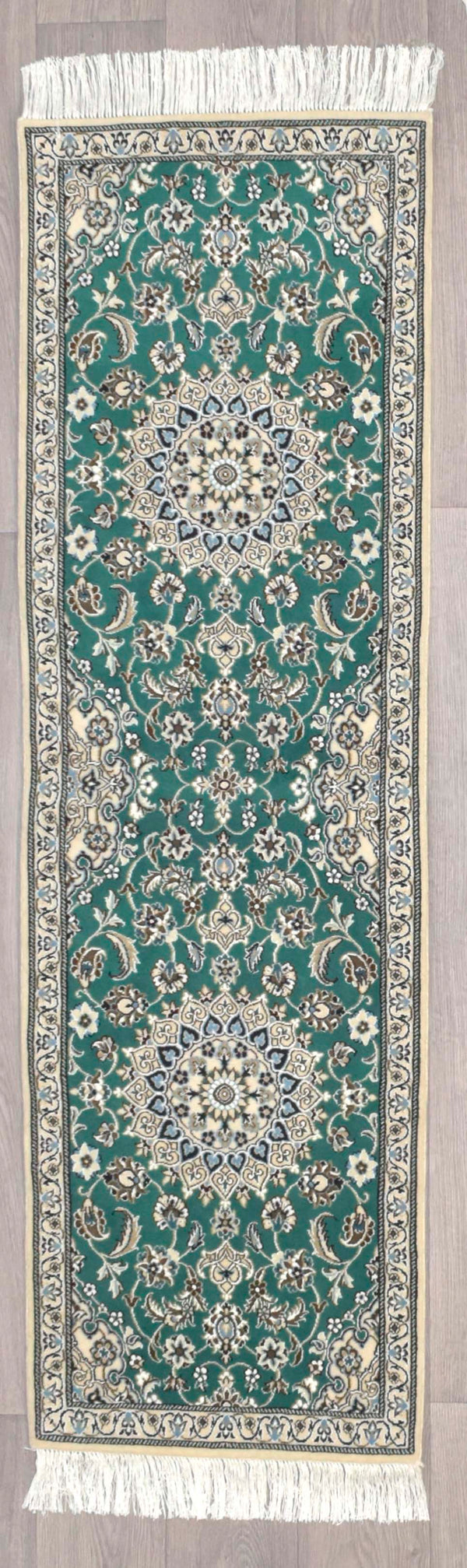 Authentic Handknotted Green Persian Nain Silk  and Wool Runner - 202cm x 60cm
Soft silk and woollen pile on this stunning Nain Runner.
Georgeous detailed weaving in classical style.
Having a light and dark side is a trademark of Handmade Rugs
Durable and Wear Resistant Suitable for High Traffic Areas