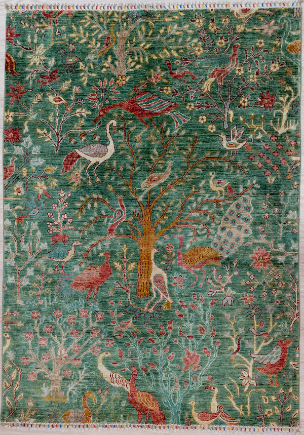 Authentic Handknotted Green Pictorial Afghan Chobi Wool Rug 200cm x 145cm woven in Shebarghan, Northern Afghanistan by rural families.
Exquisite emerald Green field made with a fermentation of Indigo and weld. Hard to achieve dye colour.
Colour tones all made from local vegetable/plant based dyes
Beautifully decorated 'Ariana' tassles on each end..At home in both a contemporary or traditional setting