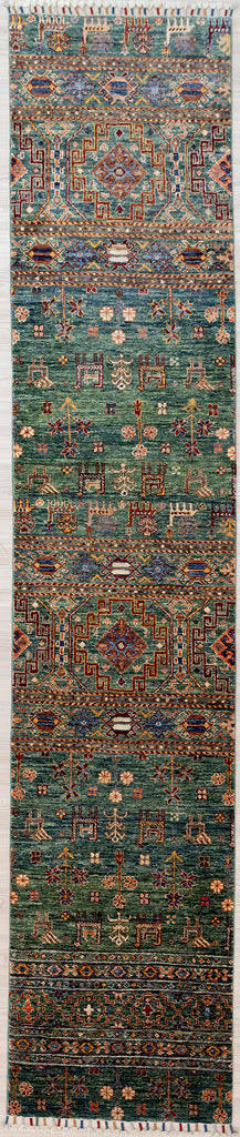 Green Pictorial Afghan Chobi Wool Runner 330cm x 70cm

Woven in Shebarghan Central Afghanistan, by artisan families living the organic rural lifestyle. This lovely farm garden inspired design enhances and brightens a hallway as well as reducing noise.

Having a light and darker aspect is a trademark of Handmade Rugs
Durable and Wear Resistant Suitable for High Traffic Areas