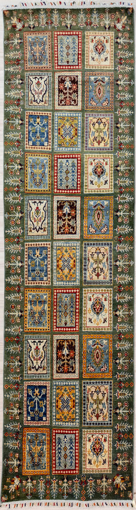 Guaranteed Handknotted Green Pictorial Afghan Chobi Wool Runner 290cm x 80cm

Woven in Shebarghan Northern Afghanistan, by artisan families living the organic rural lifestyle. This lovely walled garden design&nbsp; is bordered by the trees and fields surrounding it. This soft runner reduces noise at the same time enhancing and brightening a hallway.
