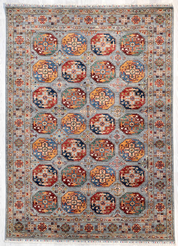 Grey Afghan Filpa Khurjin Wool Rug 244cm x  170m a gorgeous hand knotted rug with a wonderful rabbit grey modern background colour . Made from natural colours of sheep and vegetable dyed handspun wool
