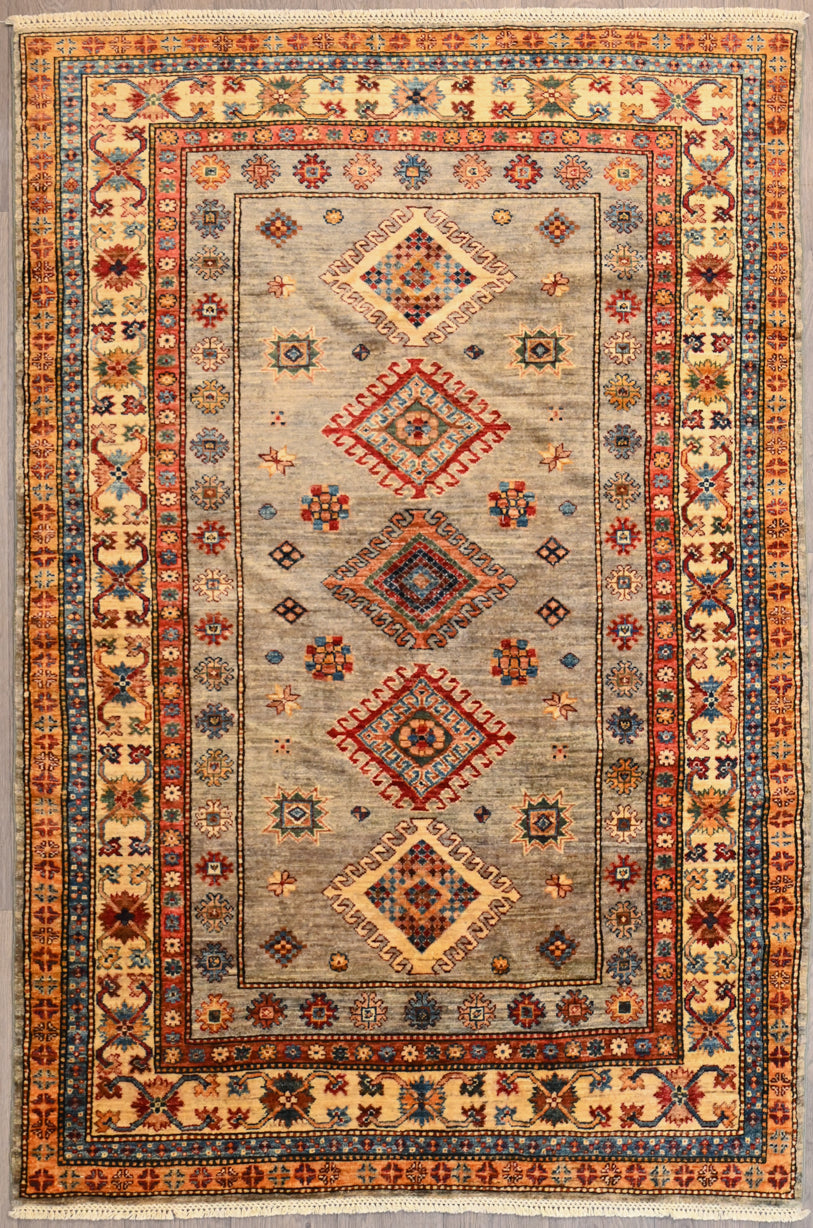 Authentic Handknotted Wool Grey Fine Afghan Super Kazak rug woven in Central Asia
"Super" refers to the super finest of weaves and the super premium quality wool pile which is soft and silky with an unrivalled sheen to the pile