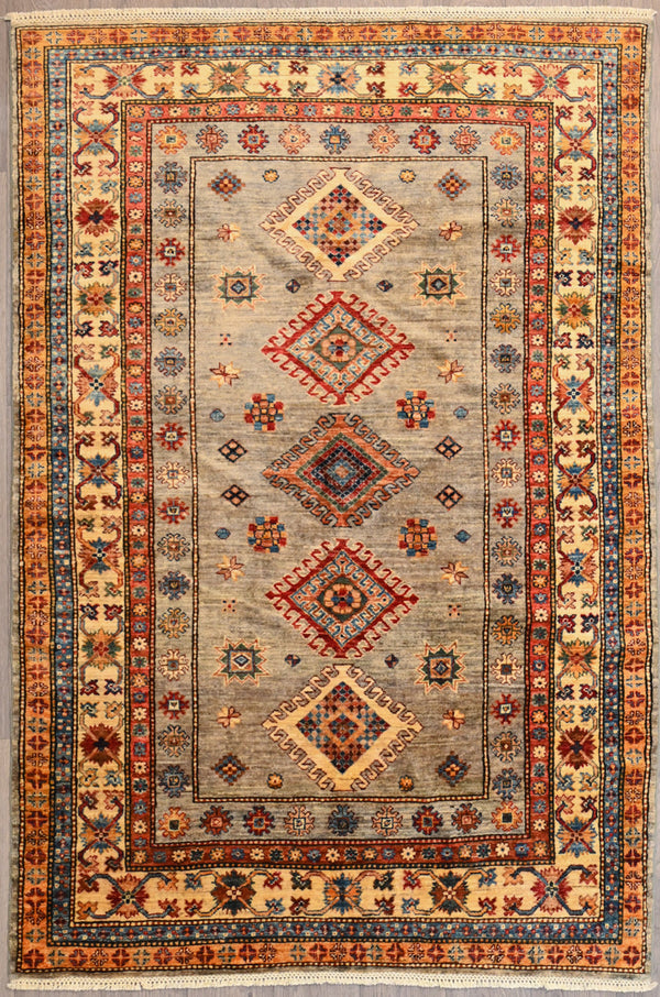 Authentic Handknotted Wool Grey Fine Afghan Super Kazak rug woven in Central Asia
"Super" refers to the super finest of weaves and the super premium quality wool pile which is soft and silky with an unrivalled sheen to the pile