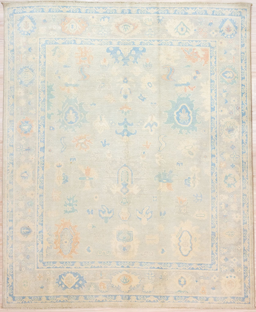 Authentic Hand Knotted Grey Peach Afghan Chobi Wool Rug 233cm x 197cm Large and suitable for dining, living or bedroom areas
Muted beige, green and blue tones on a background of marled variagated palest light peach natural vegetable dyed wool
This light toned rug is plush warm and hardwearing.
Oushak Design brightens your interior and opens your space.
One of a kind detailed piece compatible with both Modern Contemporary or Traditional settings
Having a light and darker aspect is a trademark 