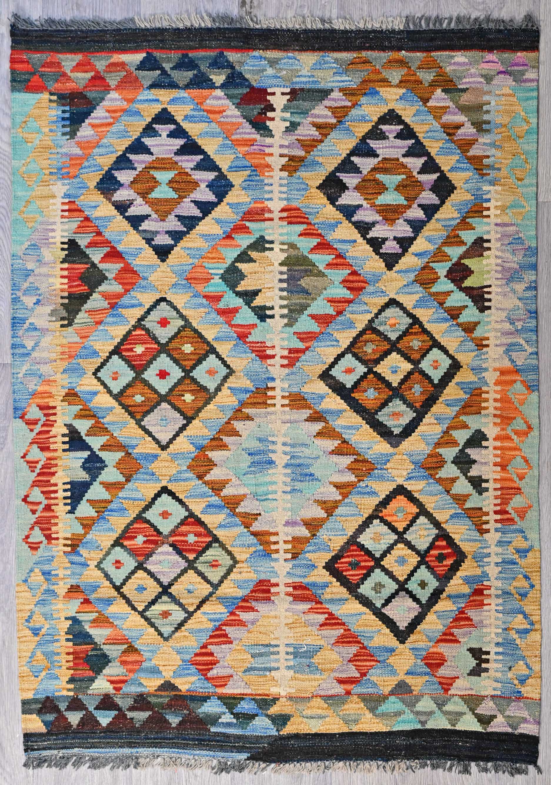 Guaranteed Original Hand knotted Wool Boho Kilim flatweave Rug woven in Central Asia

Durable and Wear Resistant Suitable for High Traffic Areas
All Colors in This Piece Originate from Natural Vegetable Dyes