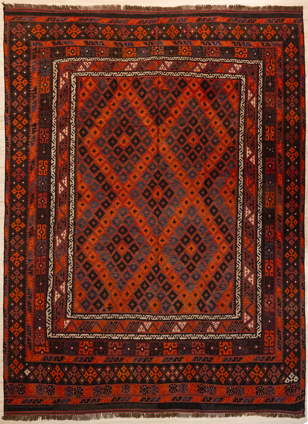 Authentic Hand knotted Vintage c.1970's Persian Wool Kilim 324cm x 250cm woven in Central Asia
Aged gracefully and in immaculate condition. Earthy tones with strong reds and oranges can compliment a Mid Century or casual boho home.
Kilims are a flat-weave rug used for over a millennium in Tribal areas of Central Asia &amp; Anatolia. Historically used by nomads as floor covering or tent lining they are able to be carried on horseback because of their lightweight nature. Perfect for a summer, or rural set