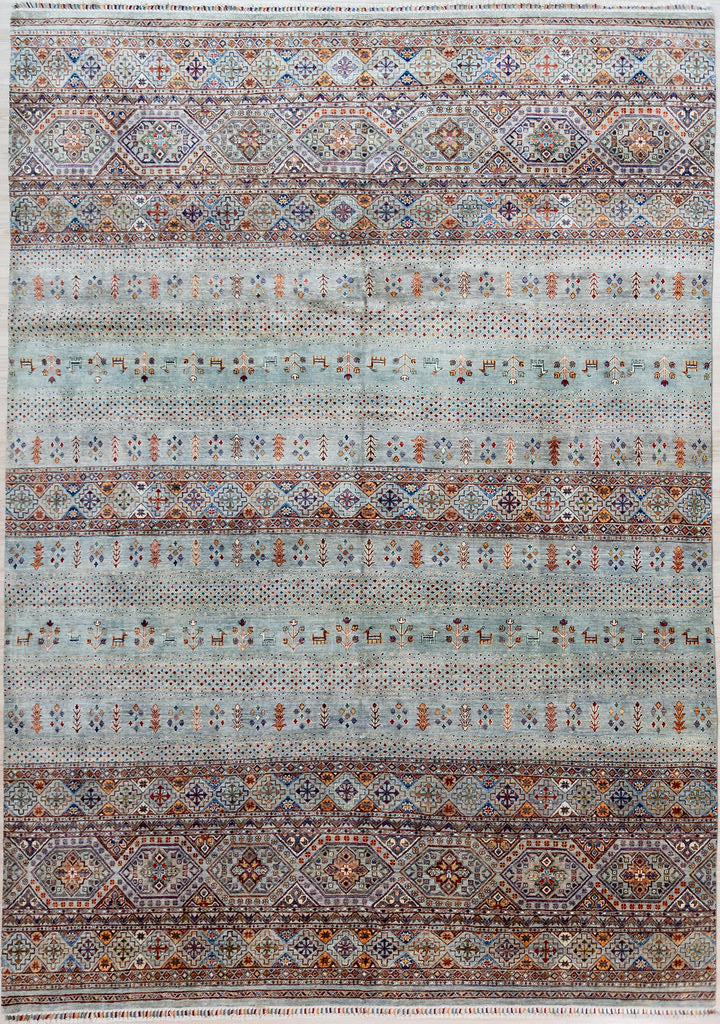 Authentic hand woven Arctic Blue XL Afghan Pictorial Khurjin Chobi Wool Rug 405cm x 307cm, woven in Northern Afghanistan
Beauituk tribal kurjin design all over, suitable for both traditional and contemporary interiors. Feature figures animals plants and geometric motifs. relax and get lost in the details of this masterpiece. Intricately hand woven with tight knots and perfect finishings, this Khurjin design in such a large rug is truly a one of a kind piece
Suit large dining table, living room or bedroom
