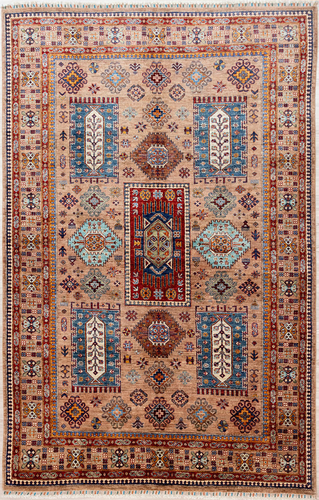 Authentic Handknotted Light Peach Afghan Chobi Wool Rug 270cm x 182cm woven in the Central region of Afghanistan by families of craftswomen.
Lovely combination of multicolour medallions on the peachy background and the four corners of the earth designated by four tree of life motifs framed in cream.

These rugs are travelling bringing blessings of peace, comfort and tranquility to homes around the world
Colour tones all made from local vegetable/plant based dyes using time honoured recipes 