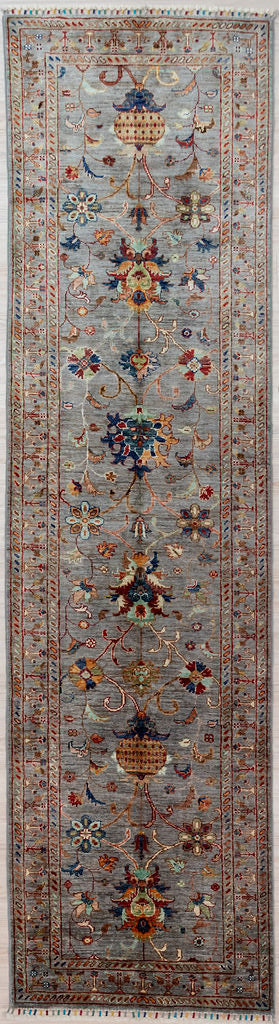 Predominantly warm grey with pops of orange, carmine, teal blue and other colour-fast veg dyed tones, an Afghan Sultani Chobi Wool Runner 305cm x 81cm
Woven in Northern Afghanistan, this lovely baroque style, effusive, curvilinear design and colour combination will gladden your homecoming every day.

Having a light and darker aspect is a trademark of Handmade Rugs
Durable and Wear Resistant Suitable for High Traffic Areas