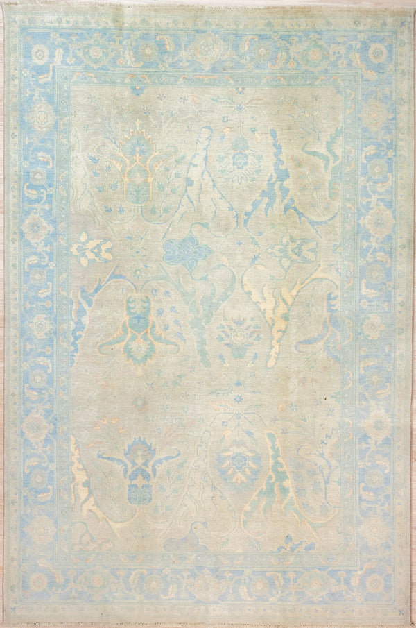 Authentic Hand Knotted Grey Muted Afghan Chobi Wool Rug 283cm x 197cm
This rug has a misty Muted Grey background and soft images of acanthus iris and lilies in a wide ornate blue and cream floral border.
Less is more with the subtle colour tones in this rug . All made with natural vegetable dyes keeping your air quality healthy
Oushak Design light toned rug brightens your interior and opens your space
This is a one of a kind piece ideal with both Modern Contemporary and Traditional settings