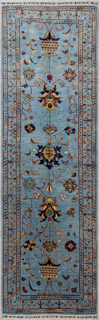 Predominantly light sky blue with motifs in multicoloured colour-fast veg dyed tones a Light Blue Afghan Sultani Chobi Wool Runner 253cm x 80cm
Woven in Shebarghan Central Afghanistan, this lovely spirited design and colour combination enhances and brightens any hallway

Having a light and darker aspect is a trademark of Handmade Rugs
Durable and Wear Resistant Suitable for High Traffic Areas