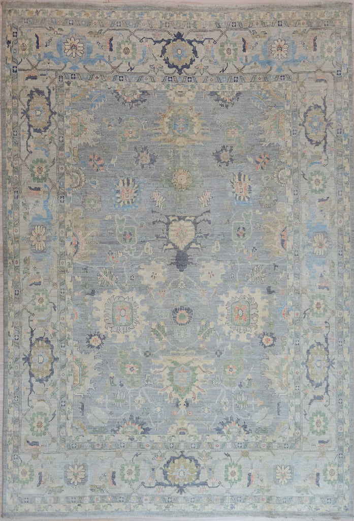 Authentic Hand Knotted Light Blue Grey Muted Afghan Chobi Wool Rug 364cm x 270cm suitable for large areas
Muted beige, green and blue tones all made from natural vegetable dyes gives a vintage or antique vibe.
Oushak Design light toned rug brightens your interior and opens your space
Having a light and darker aspect is a trademark of Handmade Rugs