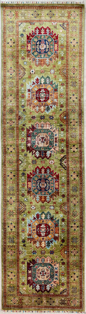 Authentic Hand knotted&nbsp; Lime Green Fine Afghan Suzani Chobi Wool Runner 304cm x 85cm
Finely hand knotted by female artisans of Northern Afghanistan.  Rare light lime green background colour perfectly offset by an earthy rust border and other splashes of natural vegetable dyed colours
This rug is truly a show stopper, totally gorgeous
Just the right way to lighten and brighten your interior..