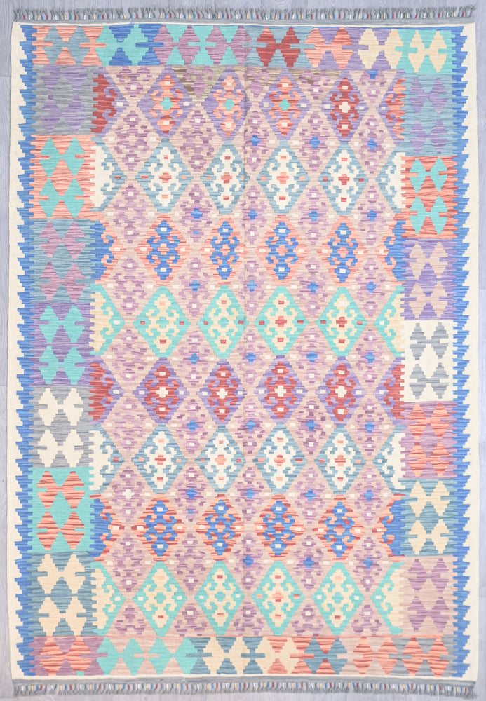 Authentic Handknotted Multicolour Afghan Boho Kilim Wool Rug 286cm x 203cm.Light and fresh vegetable dyed colours for the modern casual interior.
Durable and Wear Resistant Suitable for High Traffic Areas