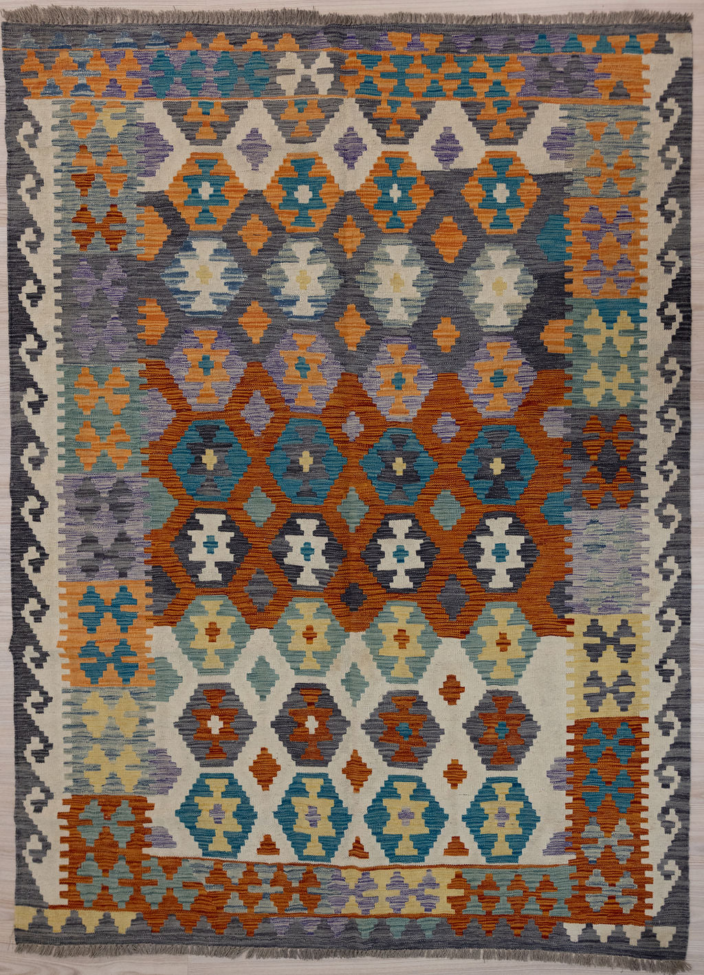 Authentic Handknotted Multicolour Afghan Boho Kilim 240cm x 176cm Hand dyed wool
Durable and Wear Resistant Suitable for High Traffic Areas