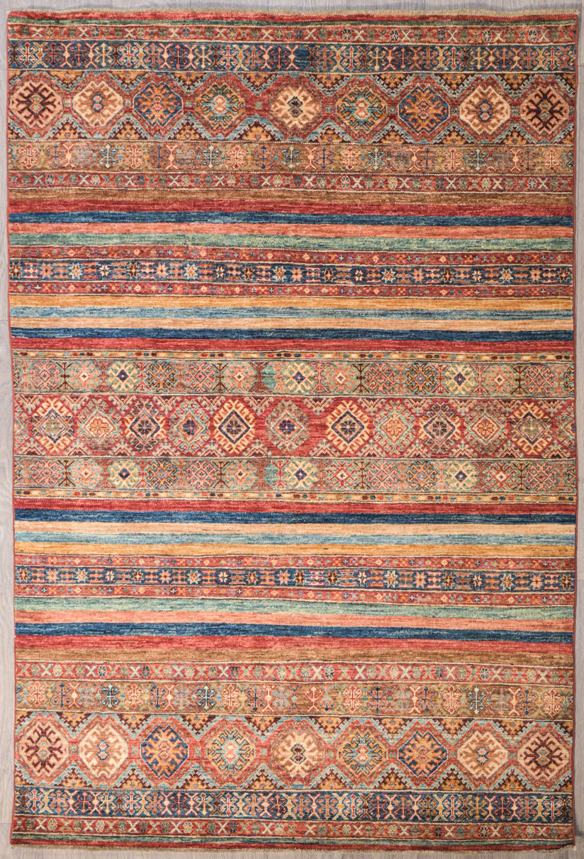 Guaranteed Original Multicolour Afghan Khurjin Wool Rug 218cm x 142cm&nbsp; woven in Central Asia
Finely handknotted by female Turkoman artisans.

Colour tones made from locally sourced natural veg dyes - crushed walnuts, indigo, apricot skin.

This rug also features natural sheep's wool background.