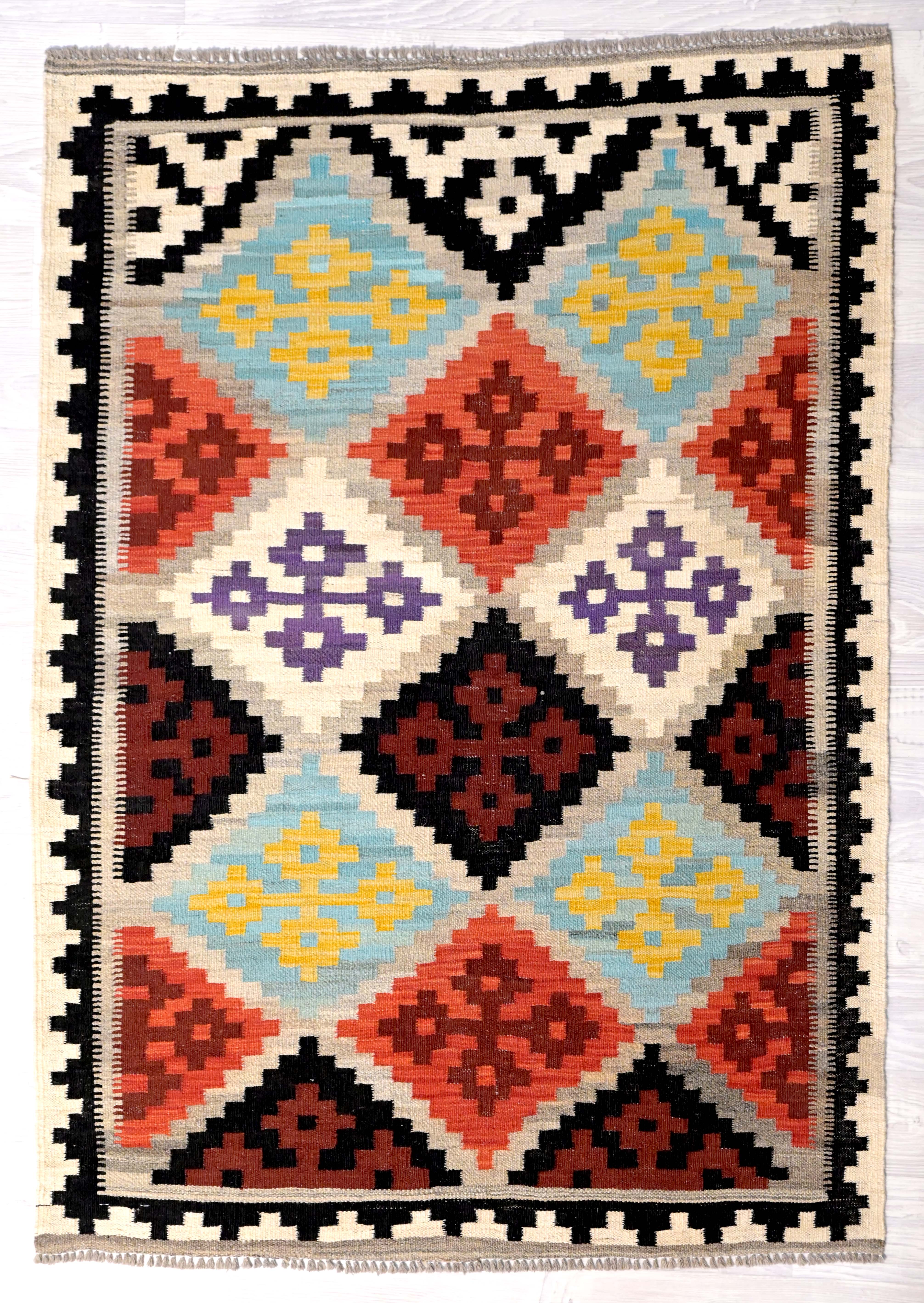 Authentic Handknotted Multicolour Boho Kilim Rug 148cm x 103cm
Emphatic contrasting motifs