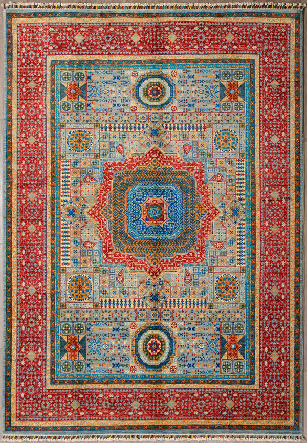 Authentic Hand woven Multicolour Mamluk Chobi Wool Rug 246cm x 175cm
Inspired by the ancient Mamluk design which consists of a Geometric patterns all over
Beautiful combination of blue centre & red border tones all made from local veg dyes