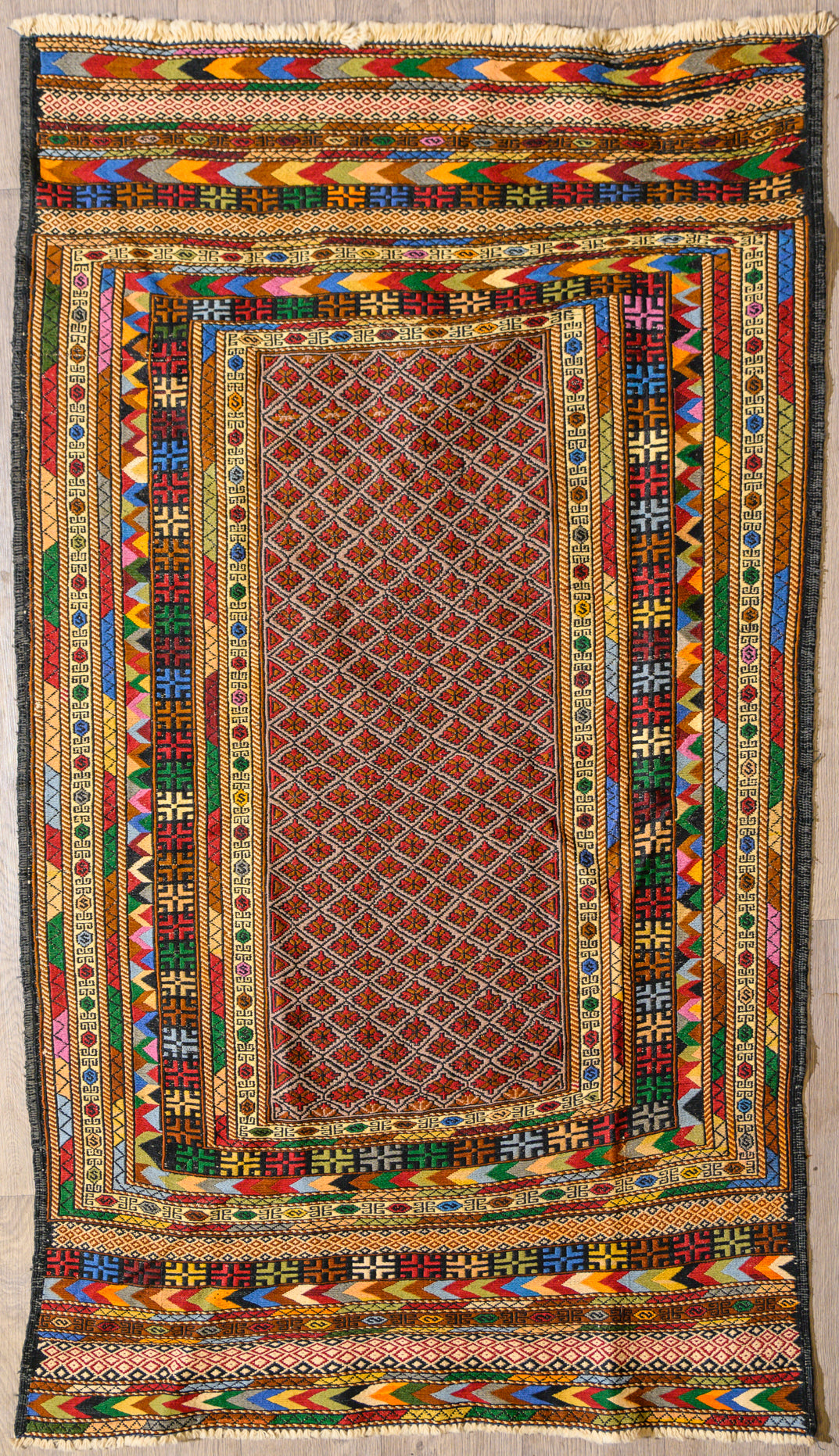 Authentic Handknotted Multicolour Persian Sumak Kilim Wool Rug 183cm x 106cm
Tribal Sumak resemble the flatweave similar to a Kilim but of higher knot count
Have a distinct "Aztec" style Design
Durable and Wear Resistant Suitable for High Traffic Areas