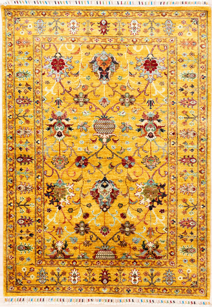 Authentic Hand Knotted&nbsp; Mustard Gold Afghan Sultani Chobi Wool Rug 171cm x 124cm woven in Shebarghan, Northern Afghanistan
a new and different colour combination of a shimmering gold field with multicolour baroque floral motifs all over.
Beautifully decorated with colourful, silk bound 'Ariana' tassels on each end
Colour tones all made from local vegetable/plant based dyes
Perfect to brighten your interior in both a contemporary and traditional setting.